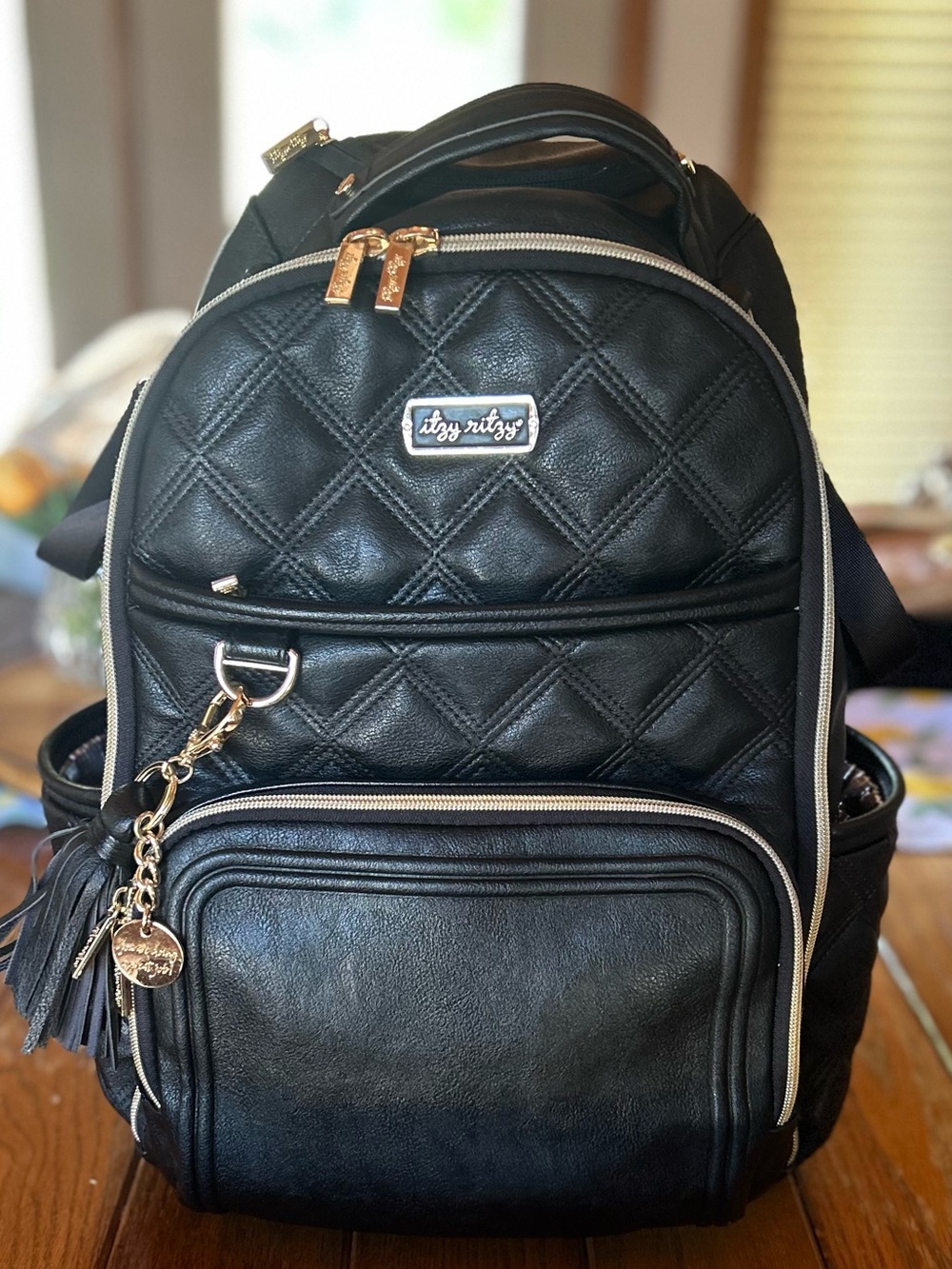 Itzy Ritzy Black Quilted Diaper Backpack with Gold Accents